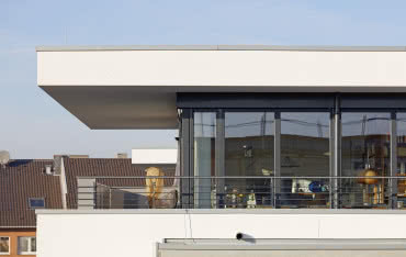 Okna z PVC-U a architektura budynku 